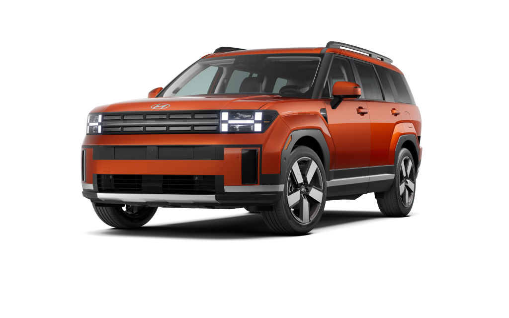 2024_SantaFe_LTD_FWD_TerracottaOrange_Black_FrontDrvrAngleWheelTurnDrlOn_WhiteStudio